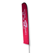 side view of red side of B2 Audio 14FT Feather Beach Flag Banner w/ Pole Kit & Base'