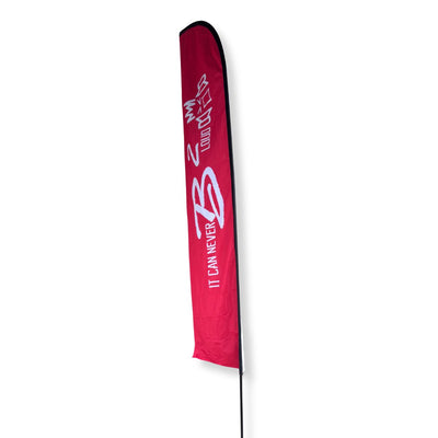 side view of red side of B2 Audio 14FT Feather Beach Flag Banner w/ Pole Kit & Base'