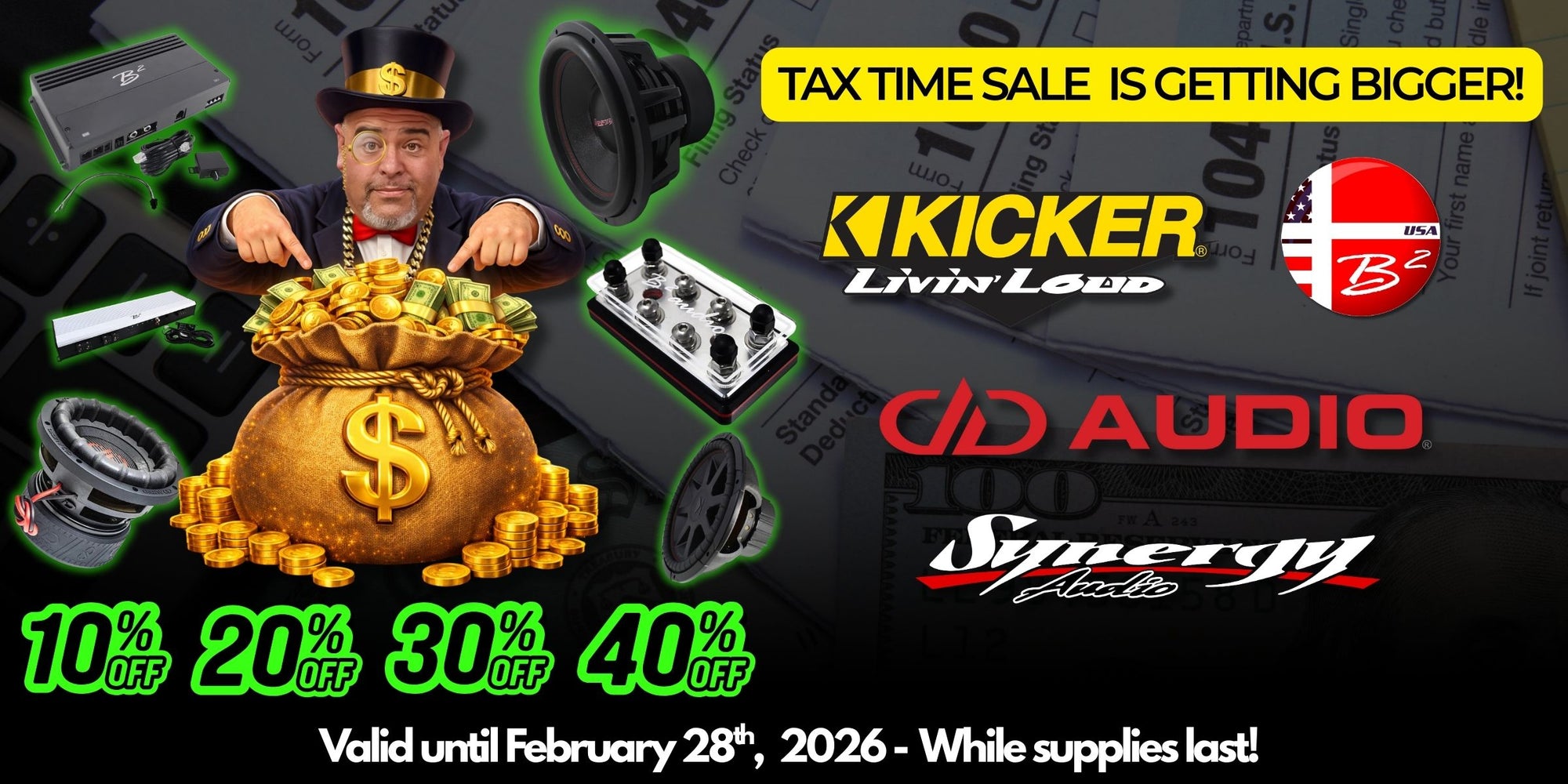 This is an image of our latest promotion,  Big Jeff Audio's Tax Time Sale  with Big Jeff dressed as the monopoly guy pointing at a money bag, surrounded by car audio products like subwoofers, speakers, amplifiers  and to the right the logos of brands like kicker, b2 audio, dd audio and synergy!